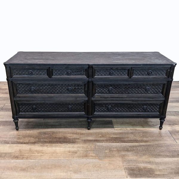 a black lacquer chest of drawers