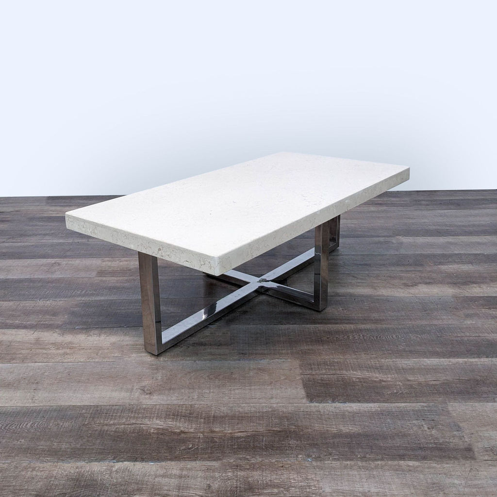 a modern coffee table with a marble top.