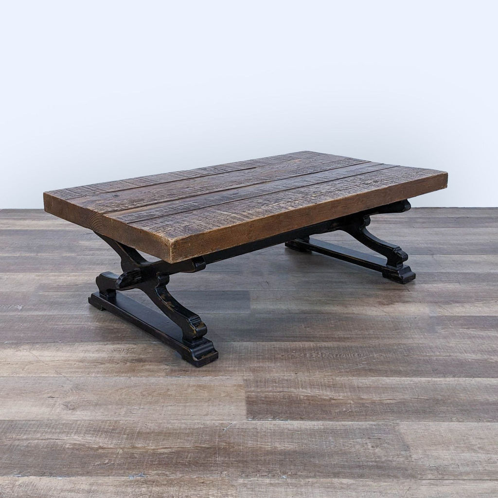 the industrial style coffee table is made from reclaimed wood.