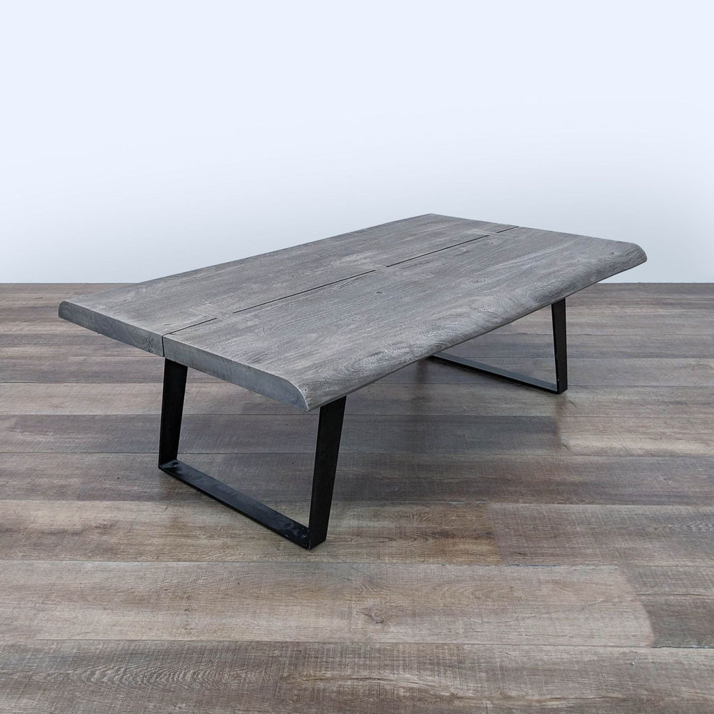 the coffee table is made from a reclaimed wood.
