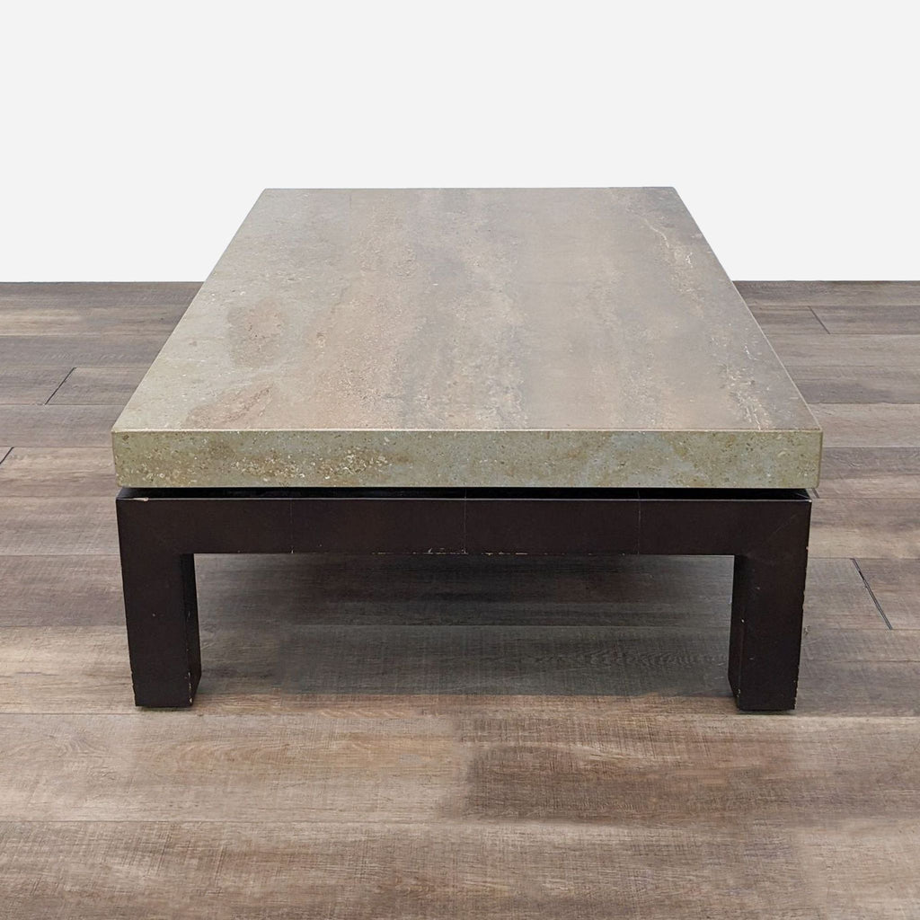 a concrete coffee table in the style of [ unused0 ]