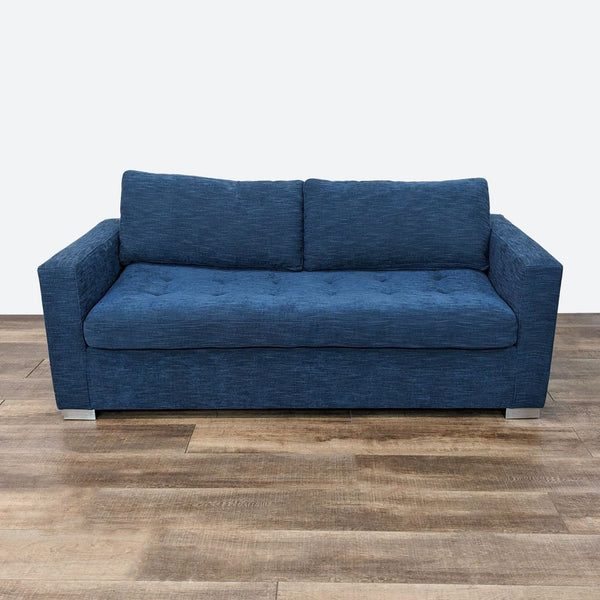 sofa in a blue fabric