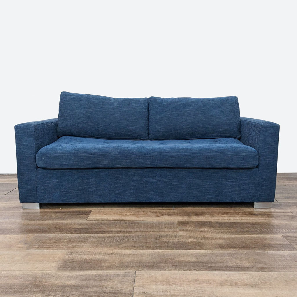 sofa in a blue fabric