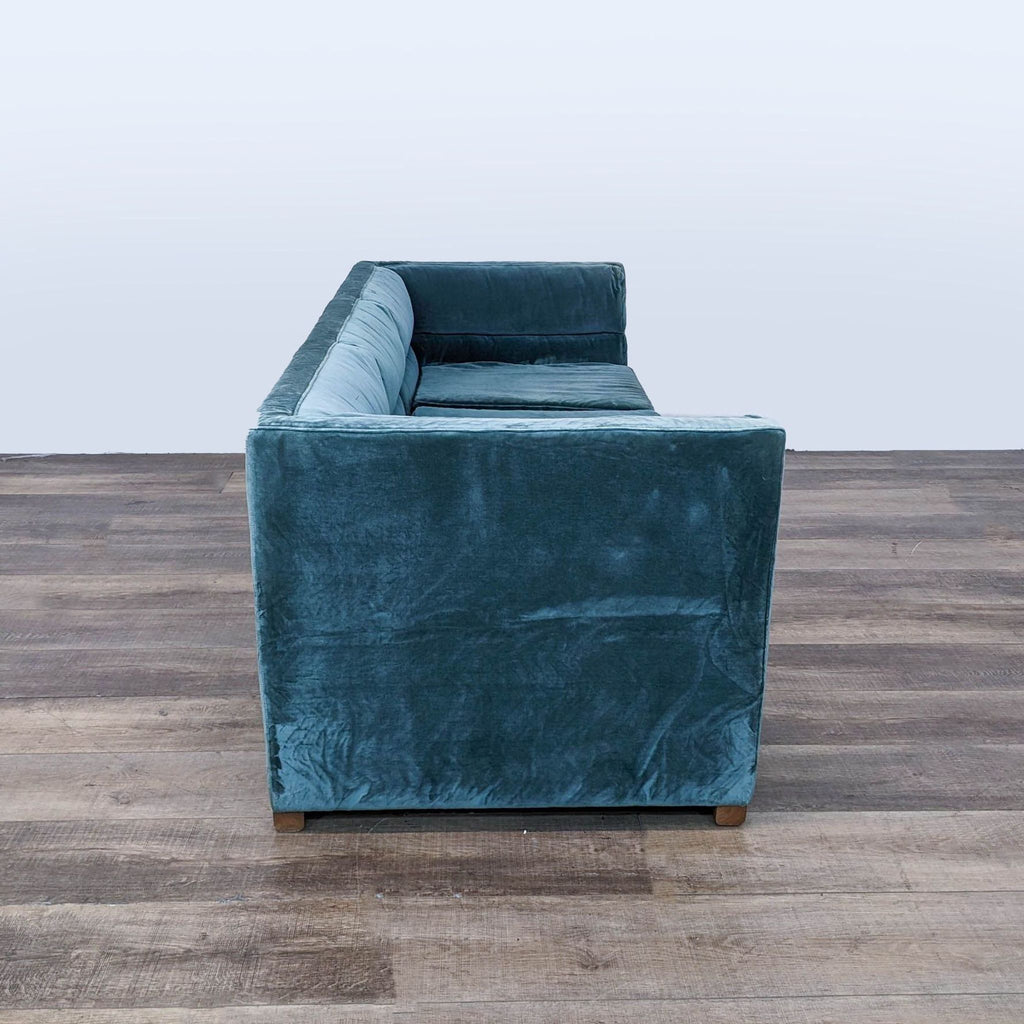 the [ unused0 ] - - teal velvet armchair
