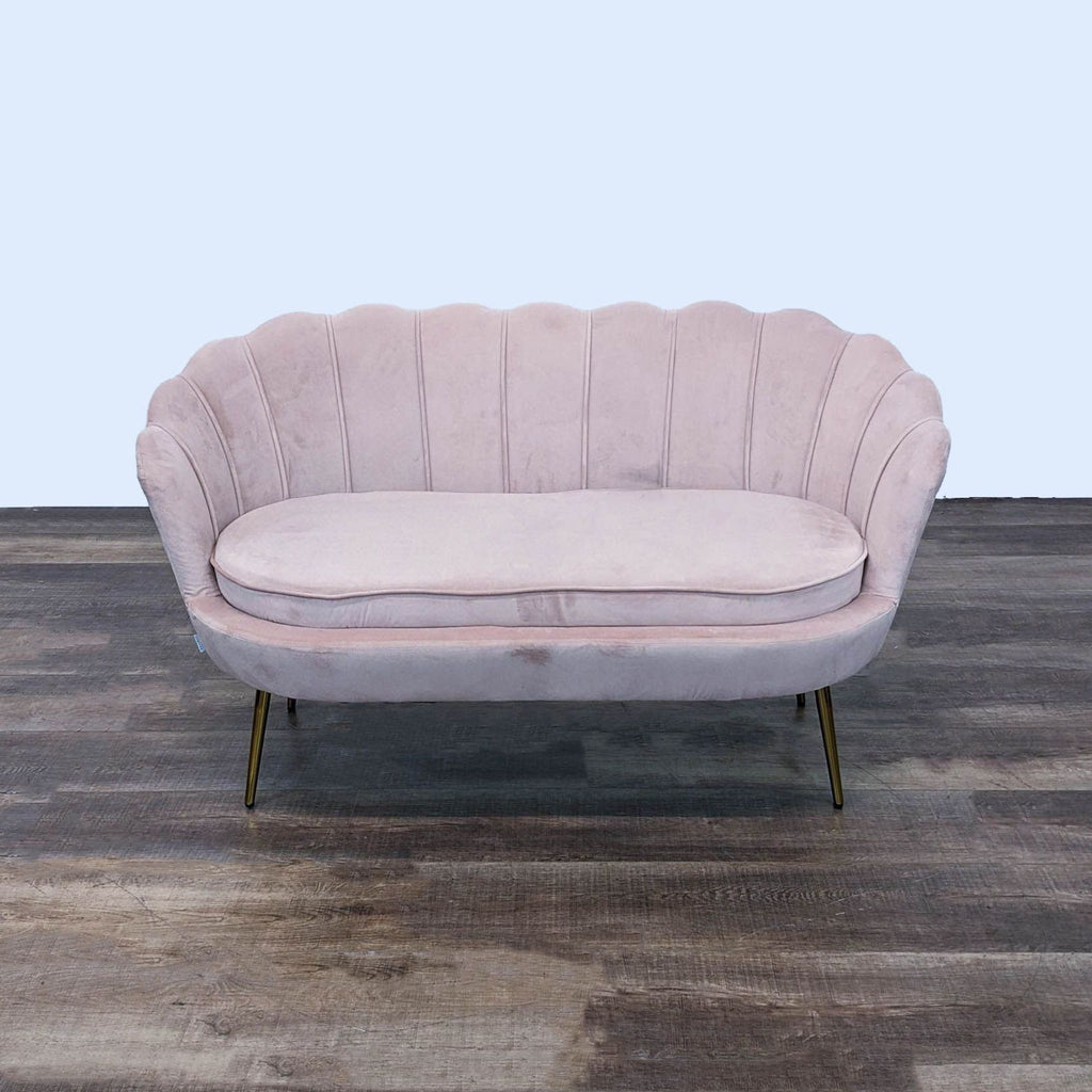 the [ unused0 ] sofa is a soft pink velvet sofa with a soft velvet seat.