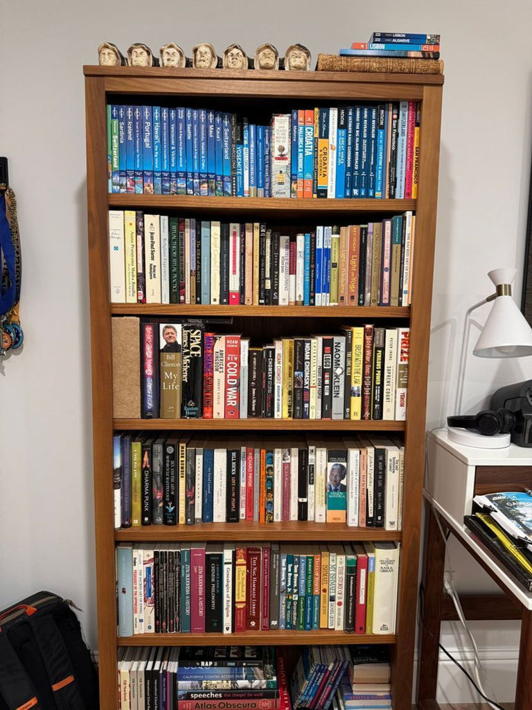 Certainly! However, I don't see the images or full description attached. Based on what you've provided—that the item is a bookshelf from Room & Board—here are three distinct, summarized alt text examples, each under 100 characters: