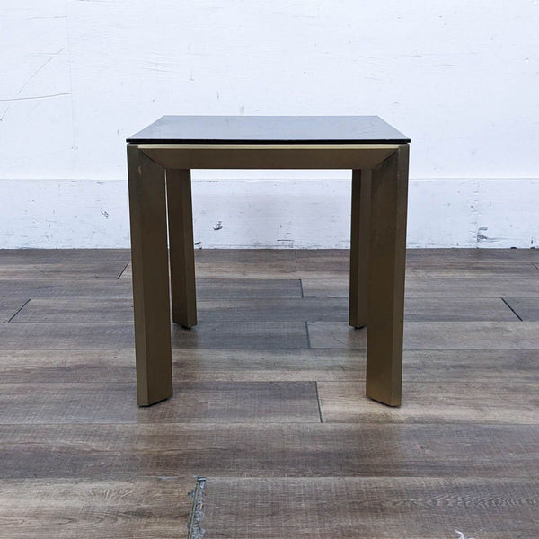 a pair of italian chrome and glass side tables by [ unused0 ] for [ unused0 ]