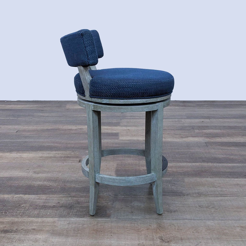 a pair of blue and grey bar stools