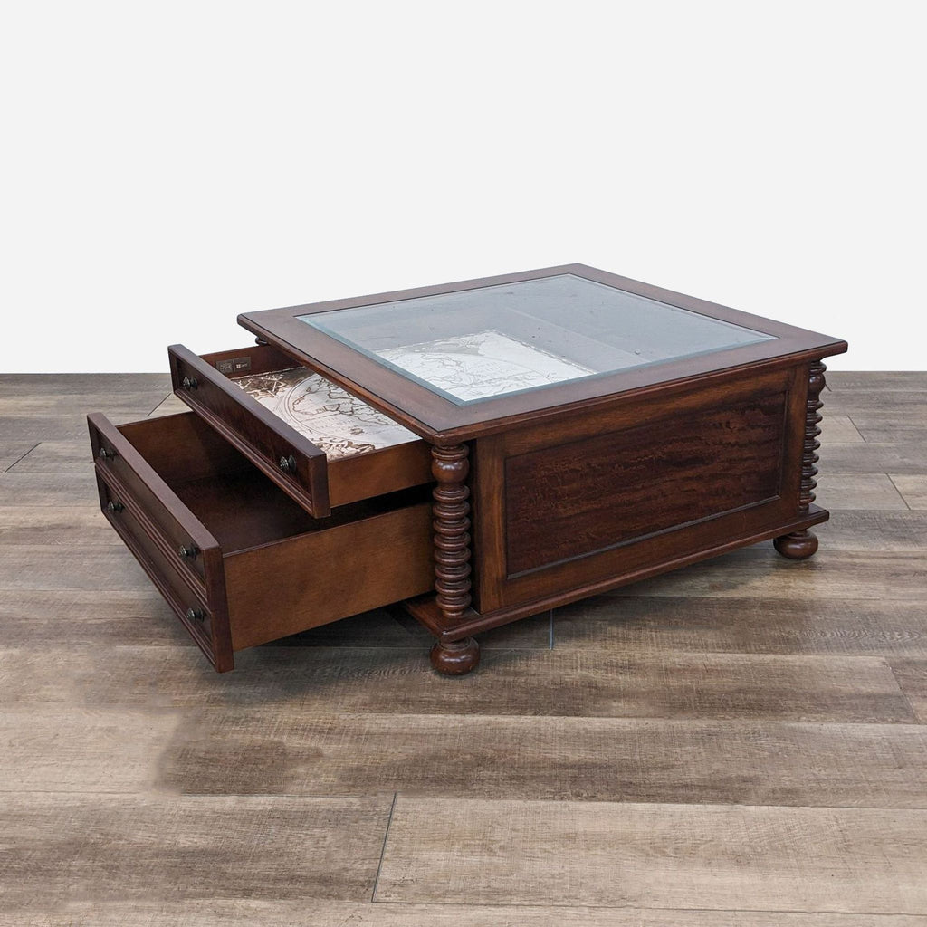 a large, antique, antique, mahogany coffee table with glass top.