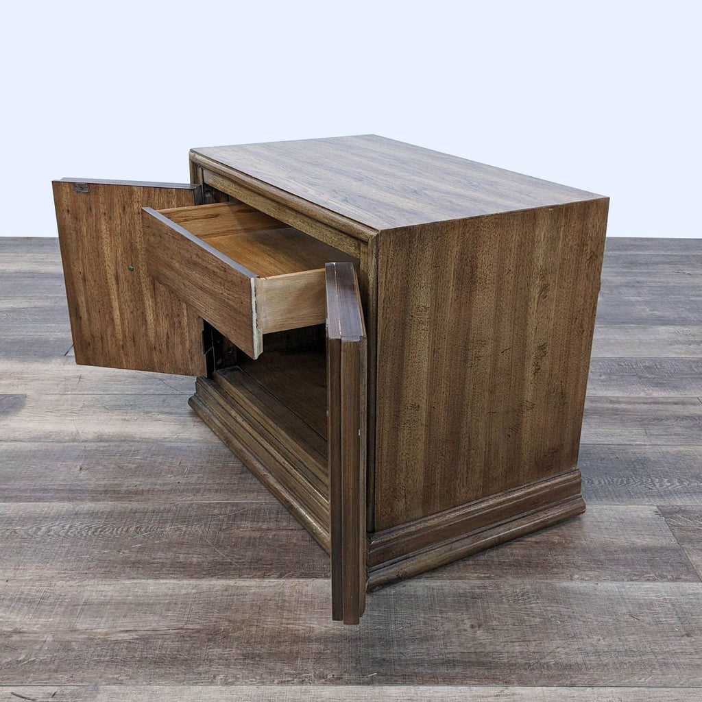 a modern wood and metal coffee table with a drawer