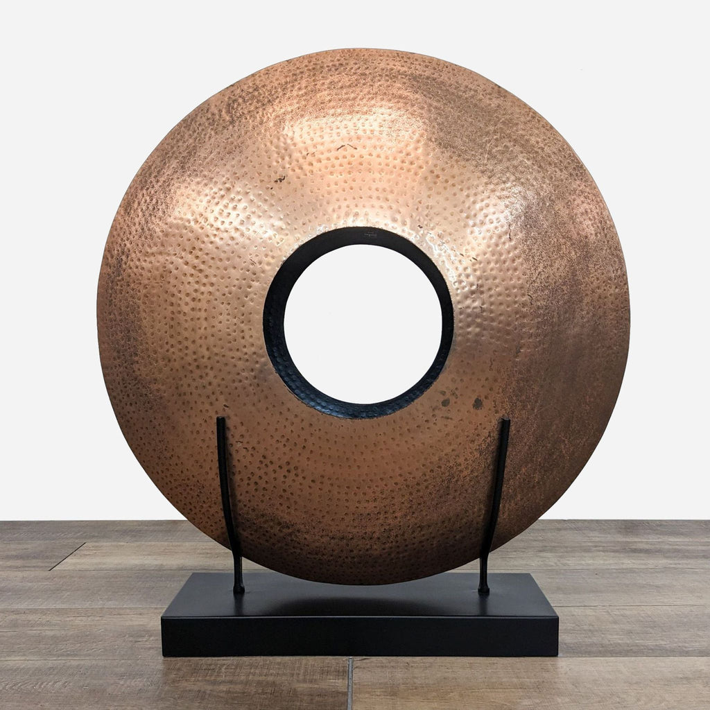 Hammered copper disc vase on stand, artistic and functional, by Reperch.