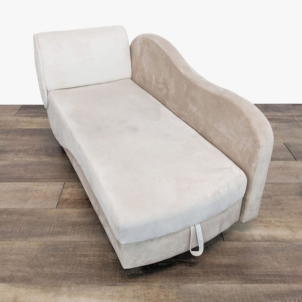 a pair of french cream leather chaise lounges