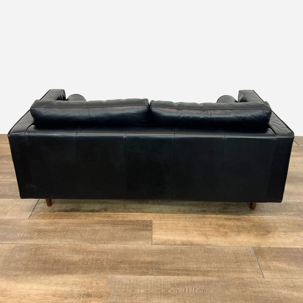 leather sofa in the style of [ unused0 ]