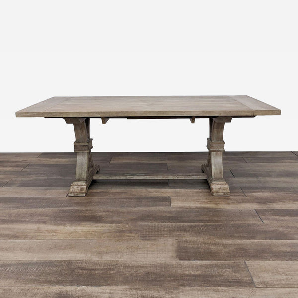a large rectangular dining table with a wooden top.