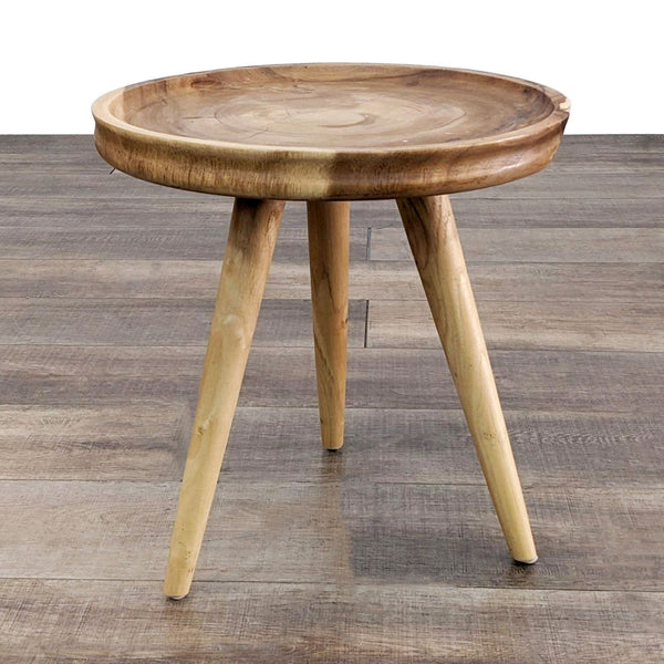 round wooden stool with a round top