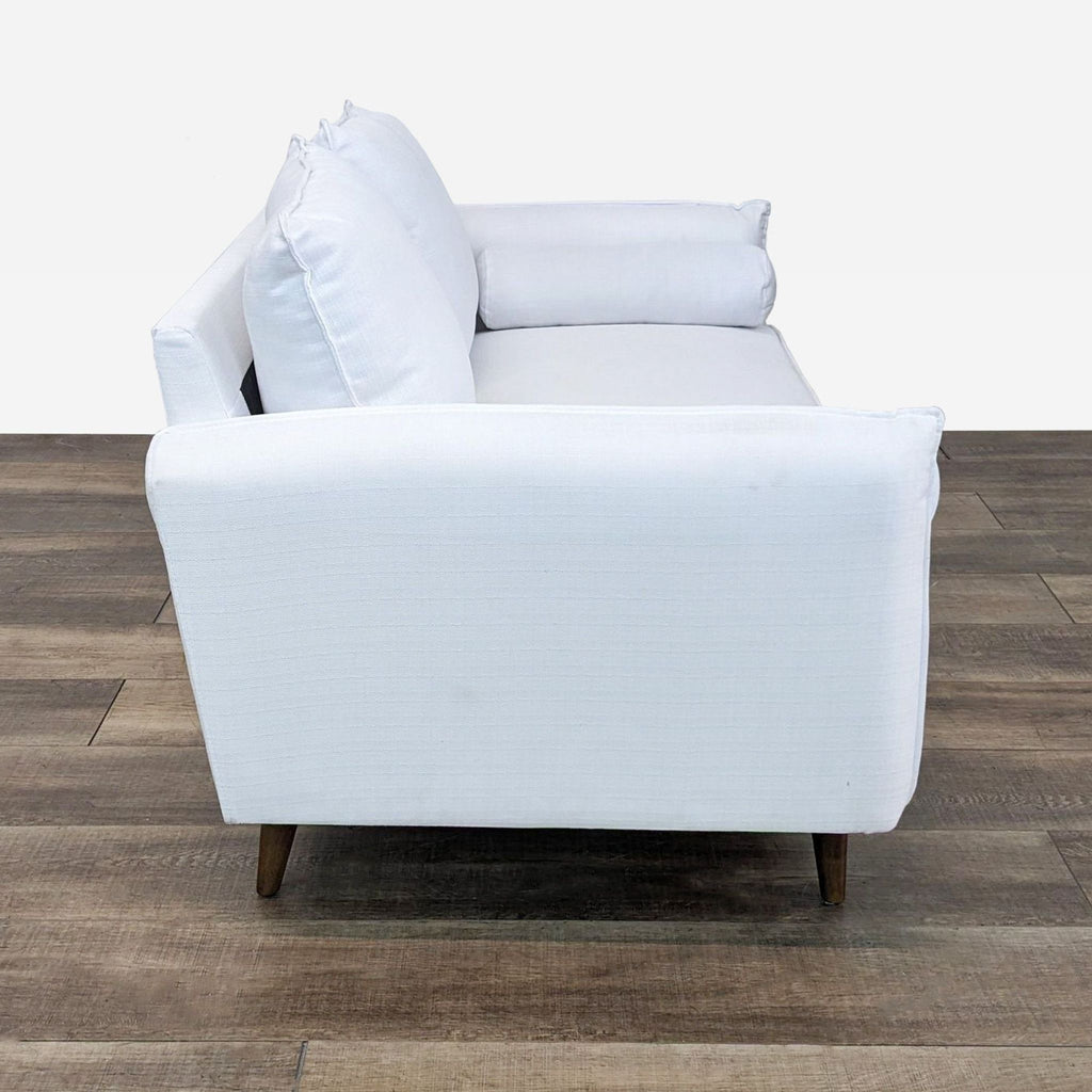 the [ unused0 ] - - white - - sofa