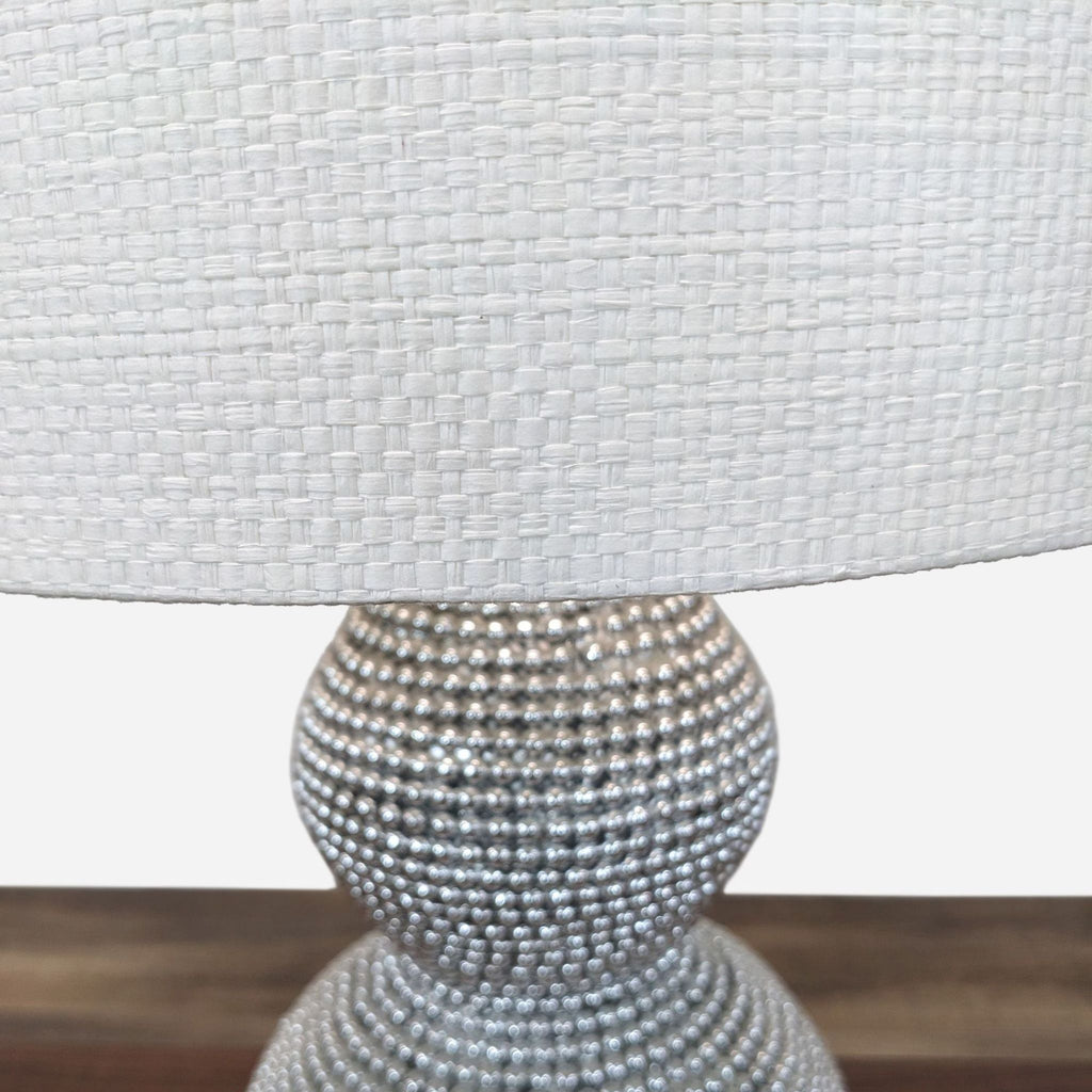 the curated nomad biltmore 3 - light grey beaded table lamp