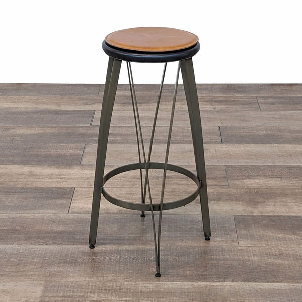 a metal and wood stool with a round seat.