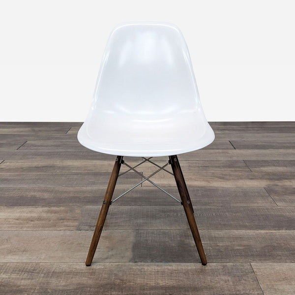 the [ unused0 ] chair is made of white plastic and has a white metal frame.