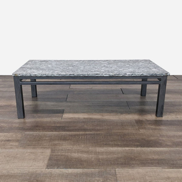 the coffee table is made from a marble slab.