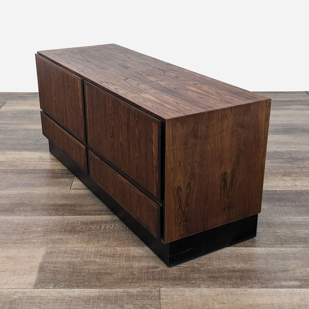 a mid century modern walnut chest of drawers