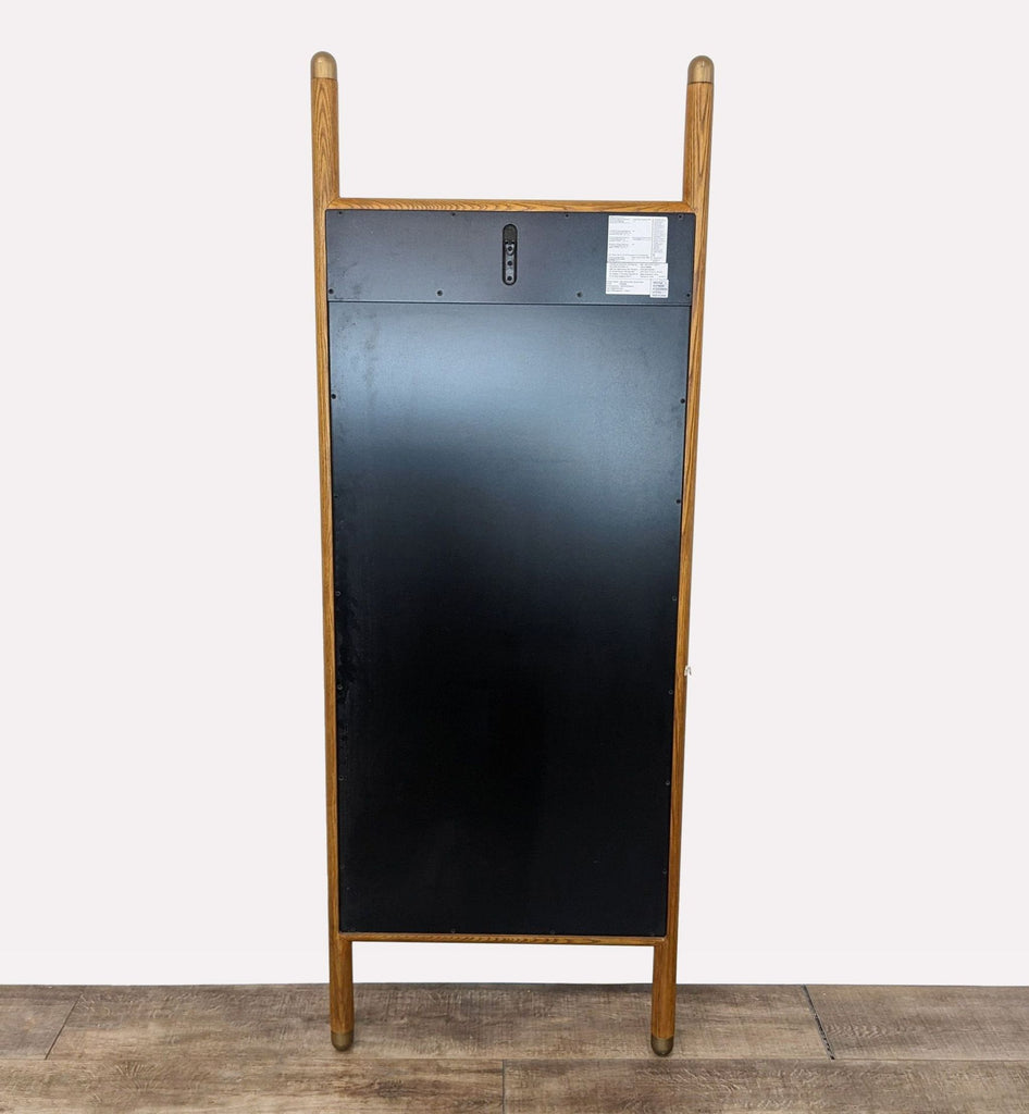 3. Back view of Williams Sonoma Mid Century Dowel Mirror showing wood frame and hardware details.