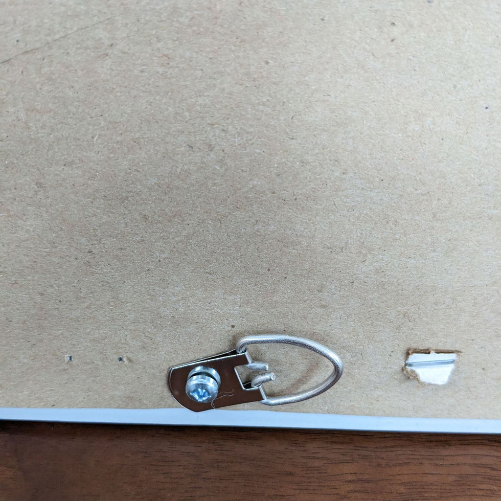 a metal clip with a metal clip attached to it.