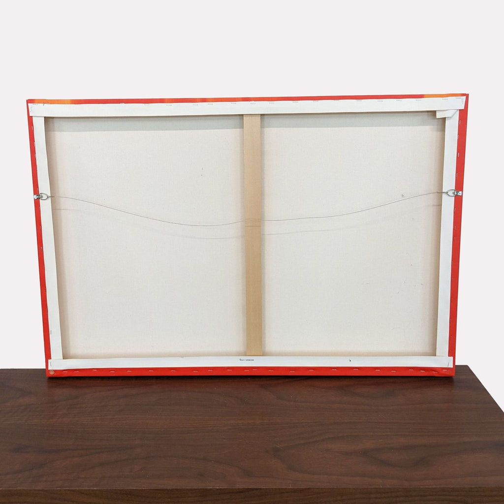 a small wooden table with a white board and a red board.