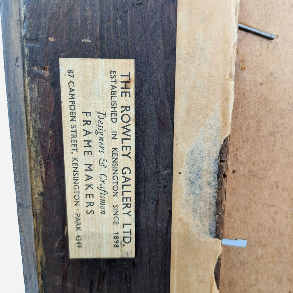 a large wood frame with a label on the back of it.