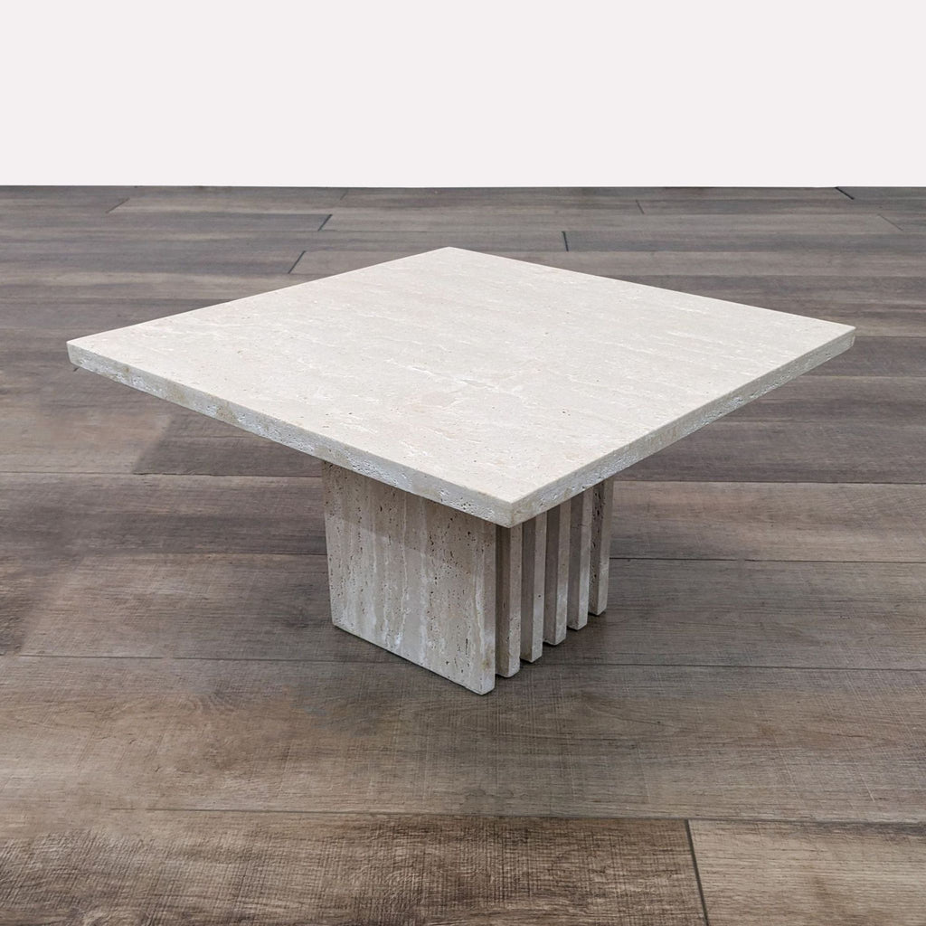 CB2 Carved Travertine Cocktail Table