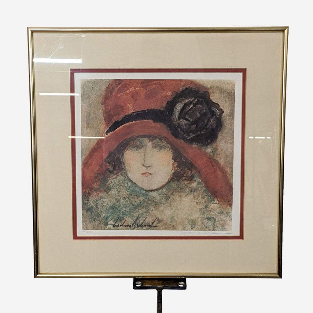 a framed painting of a woman in a red hat