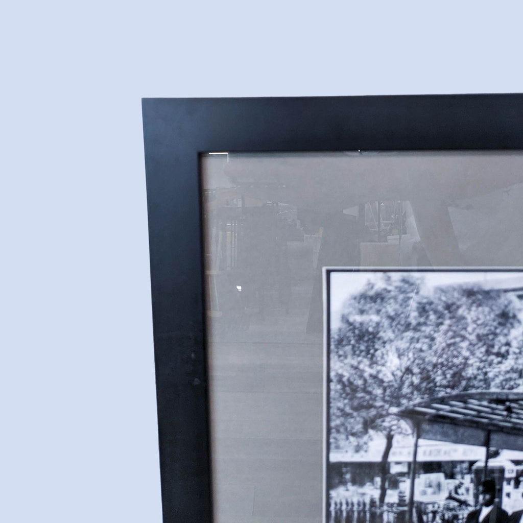 Partial view of framed historic print, emphasizing the Clay St Railroad setting and street scene.