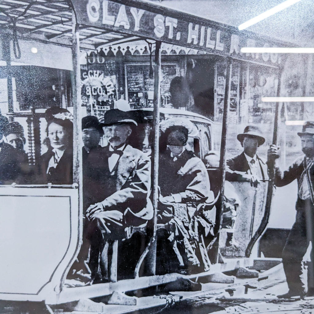 Close-up of passengers on a historic Clay St Railroad car, displaying detailed vintage attire.