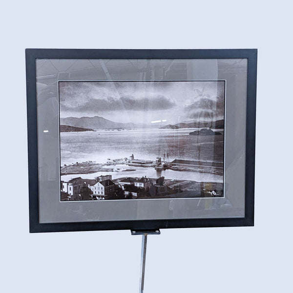 a framed photograph of a view of the sea