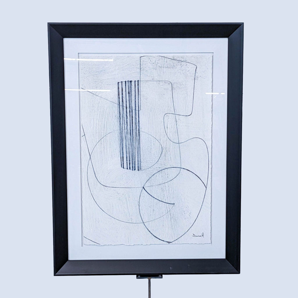 a framed drawing of a circle and a circle