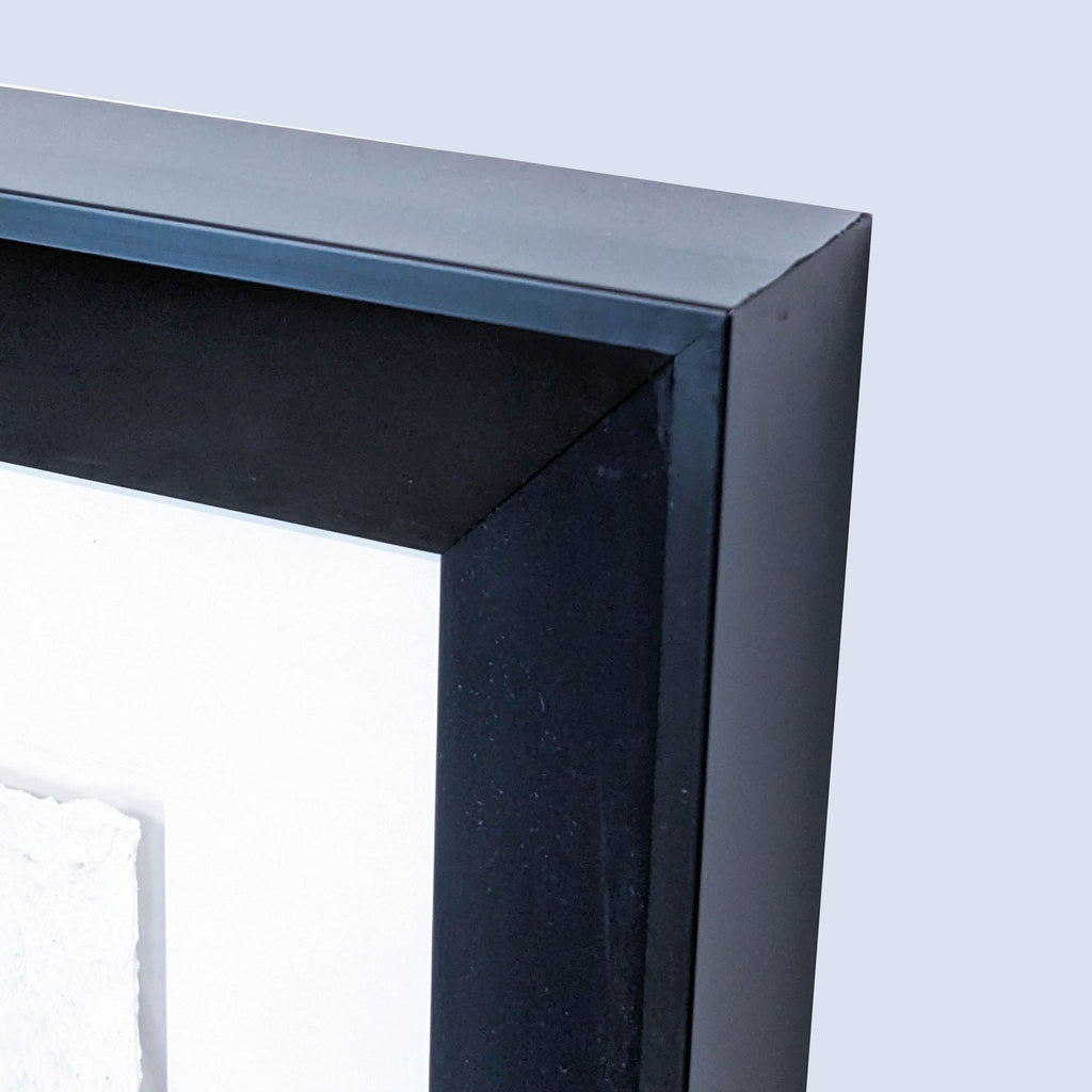 the frame is made of metal and is made of a black lacquer.