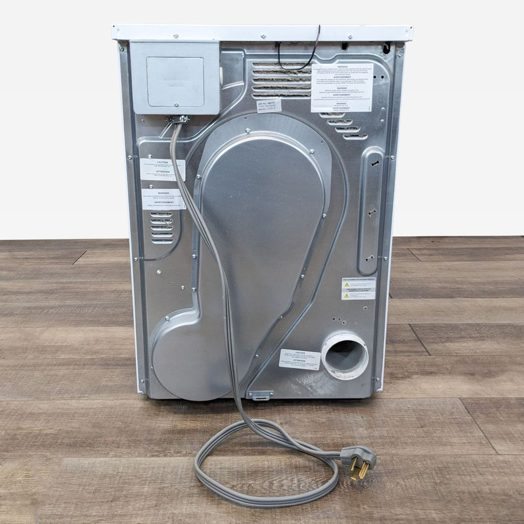 a small electronic device is on a wooden surface 