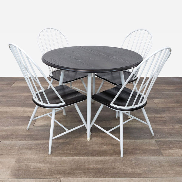 the [ unused0 ] dining table with black leather chairs