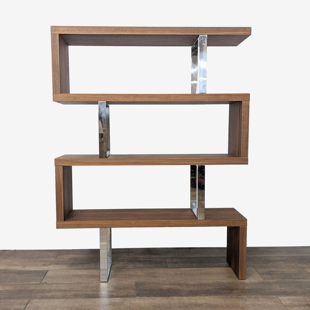 Reperch bookshelf with walnut veneer and stainless steel accents, front view.