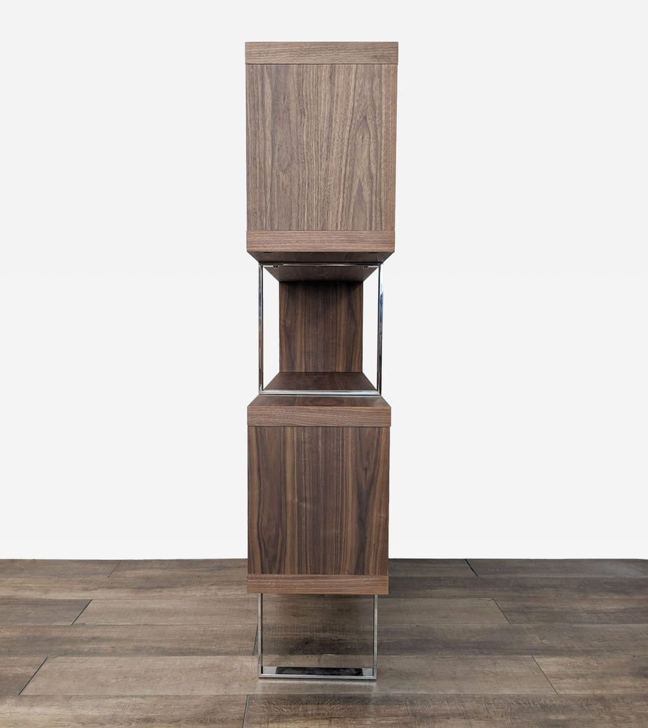 Reperch bookshelf in walnut finish with a sleek stainless steel frame, back view.