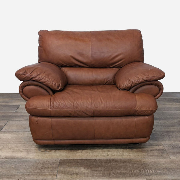 a brown leather recliner with two arms.