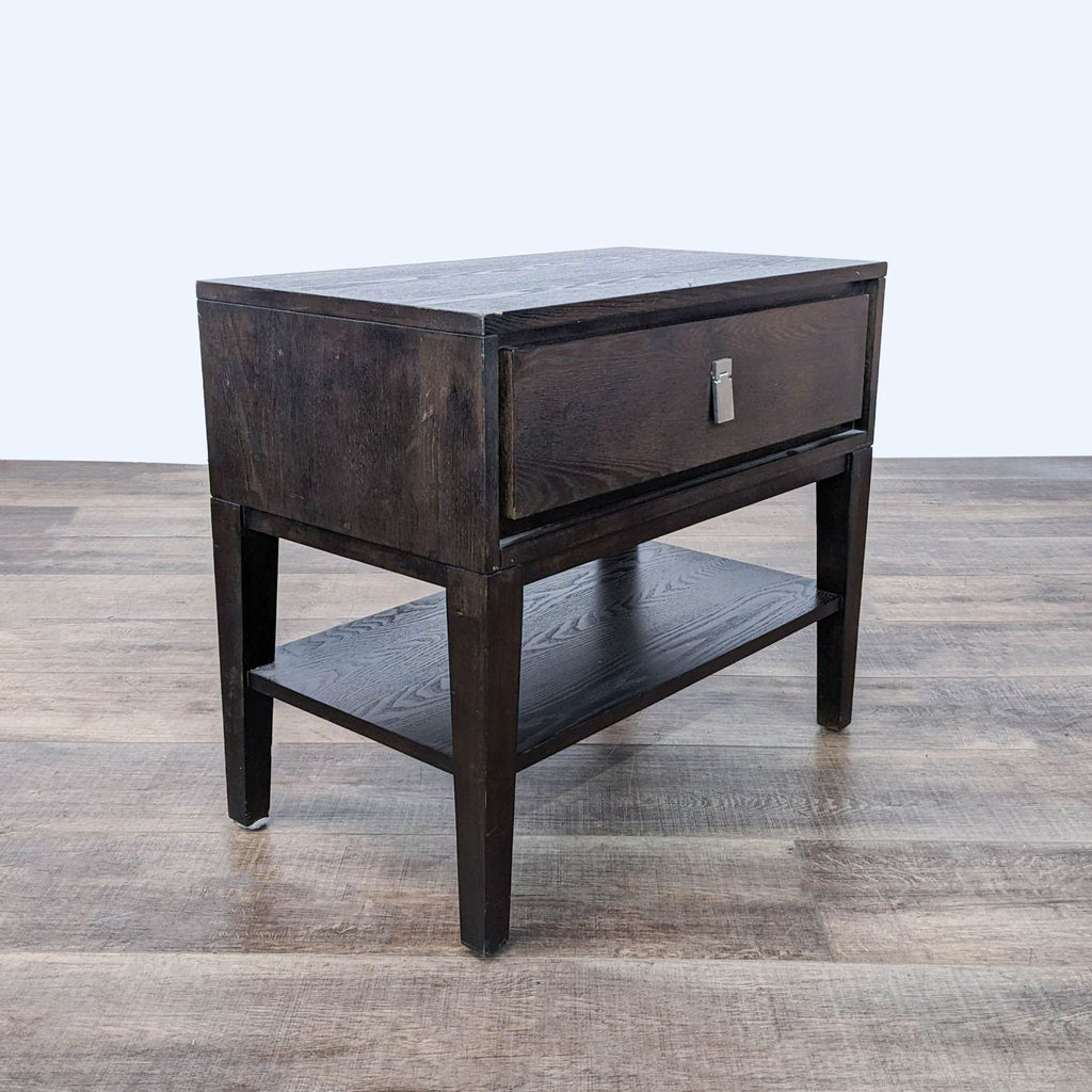 a dark brown wood bedside table with a drawer and a drawer.