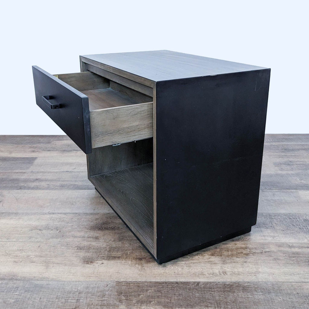 a modern, industrial style black and white metal side table.