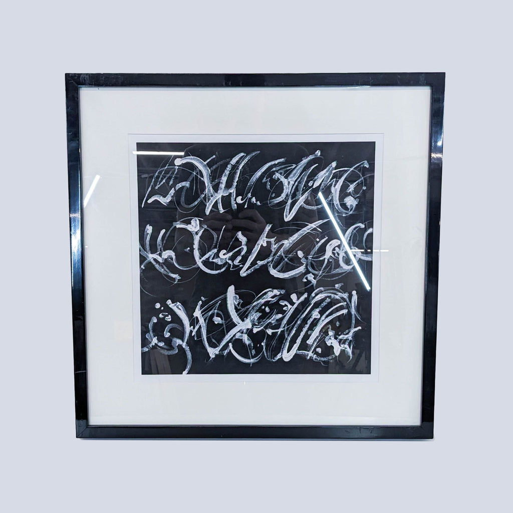 a framed painting of a black and white abstract painting