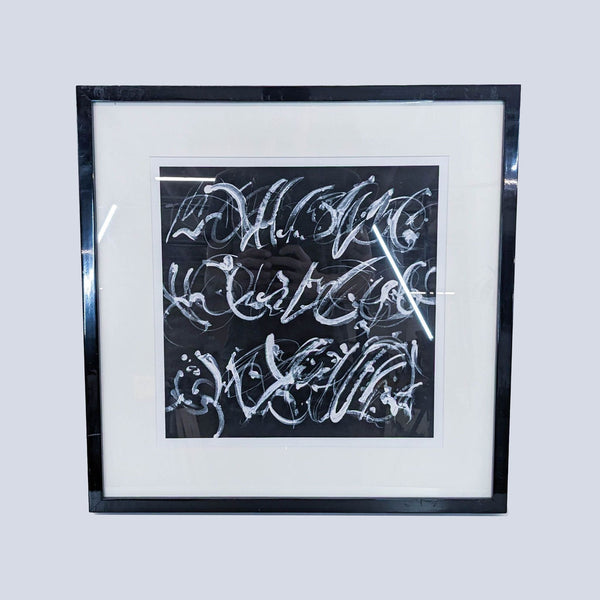 a framed painting of a black and white abstract painting