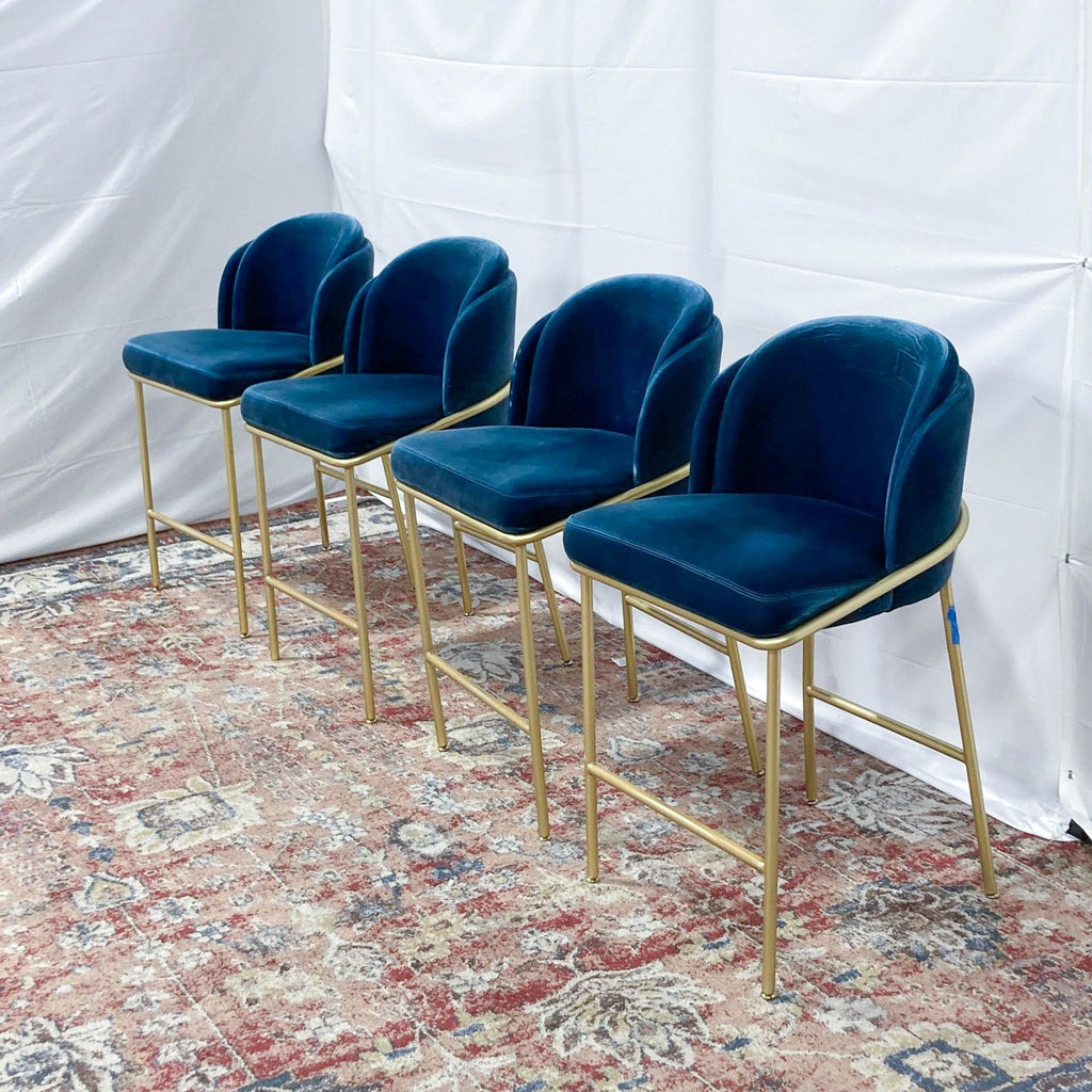 a set of four dining chairs in the style of [ unused0 ].