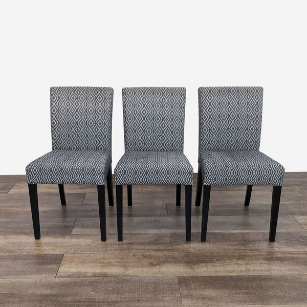 a set of four dining chairs