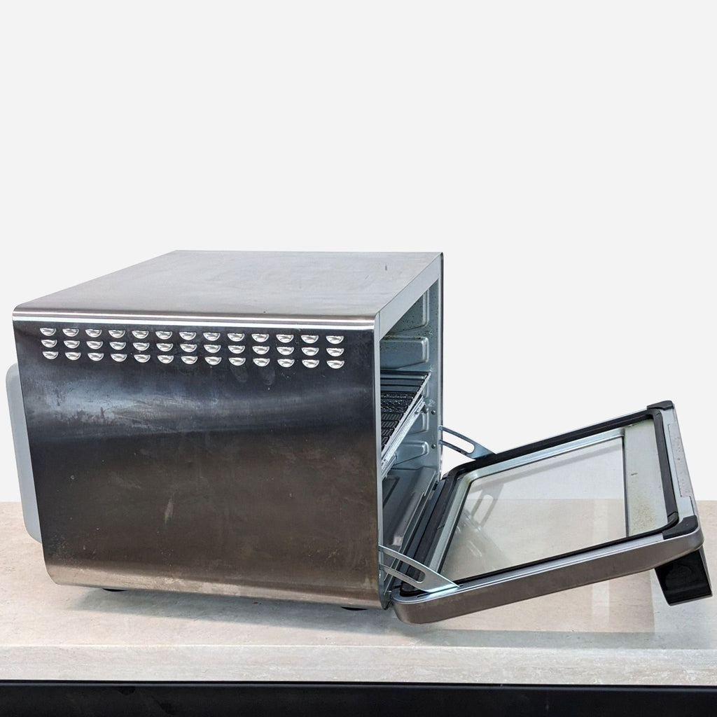 a small oven with a door open