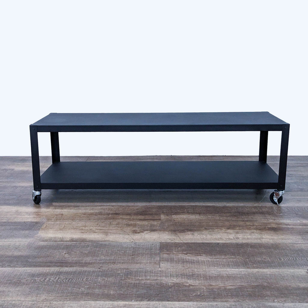 the coffee table is a modern coffee table with a black metal frame and wheels.