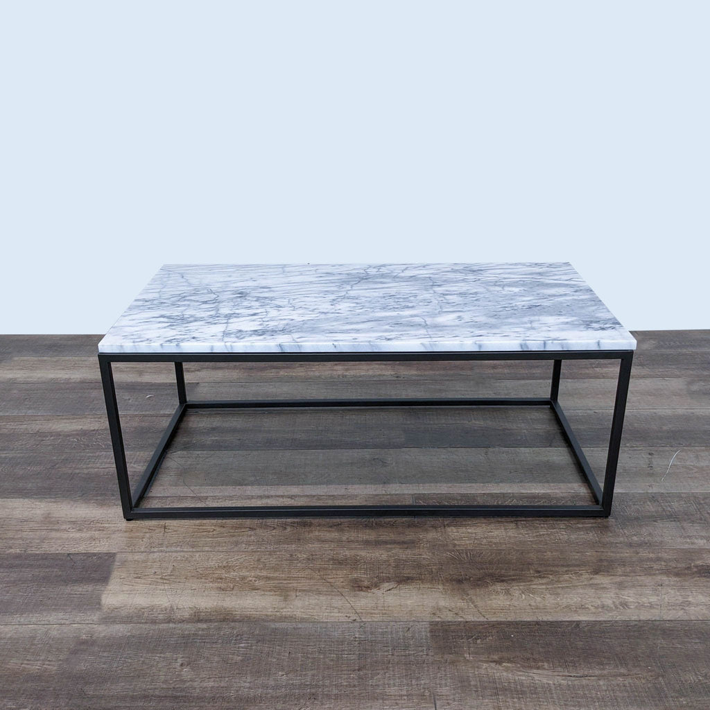 marble coffee table with a black metal frame